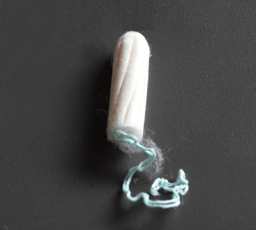 图5展示了卫生棉条的外观,一般是将棉压缩成棒状,带有一根棉绳。